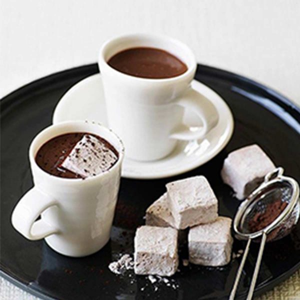 Heart Stopping Hot Chocolate with mallows placed in a black tray