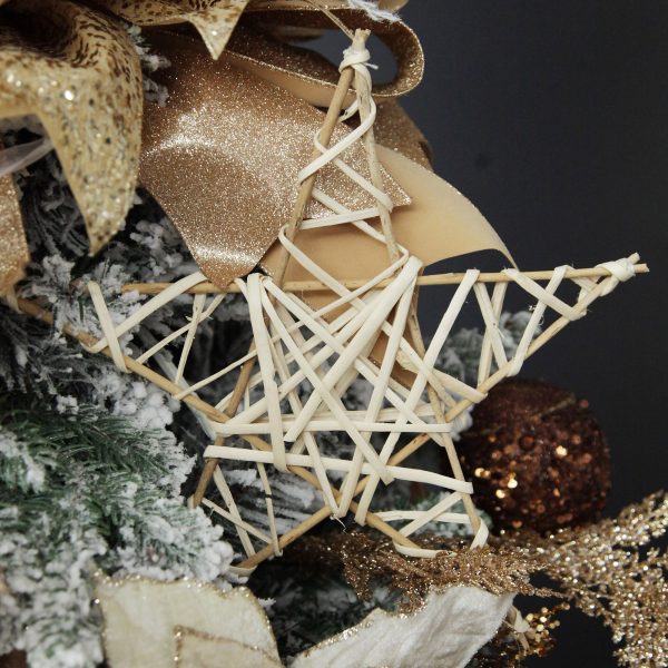 Boho Glam Christmas Natural Woven Star placed in a Christmas Tree
