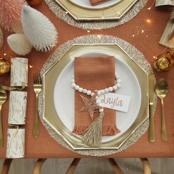 Boho Glam Christmas Table Place Setting with golden fork spoon and bread knife