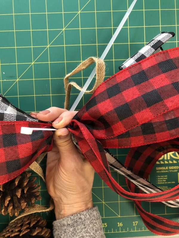 Farm fresh christmas pinecone drop bow wrap cable tie around both