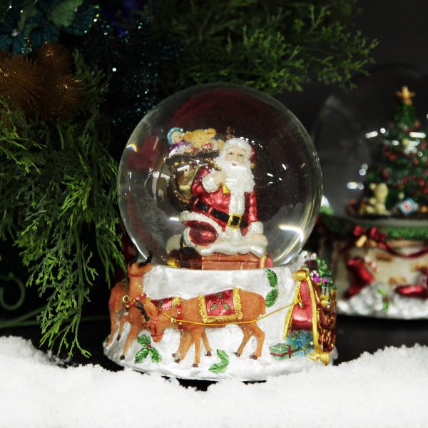 Nucracker Christmas Musical Snowglobe with Santa and his Reindeers