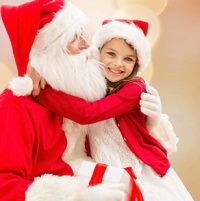 Create Beatufiful Gifts from Santa Photos Girl hugging Santa Claus