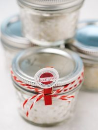 Infused Salts with a red ribbon wrapped