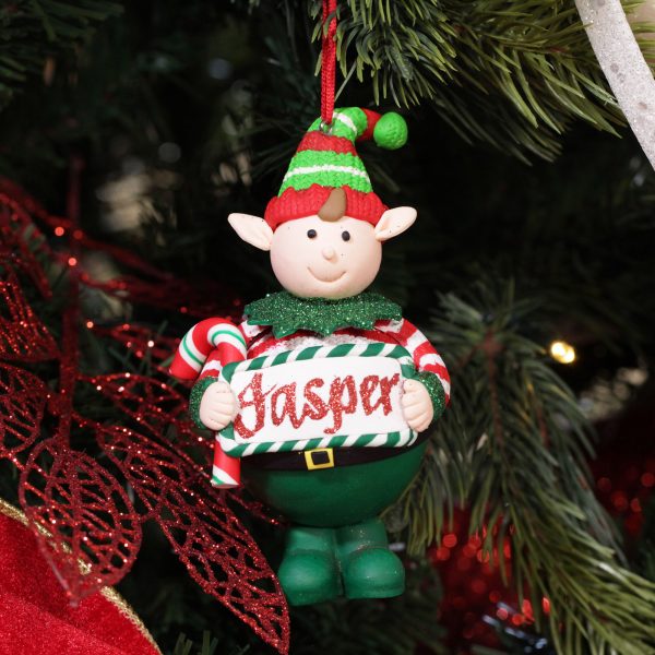 A Christmas Kitchen Personalised Elf Boy with Candy Cane Tree Decoration Hanging in a Christmas Tree