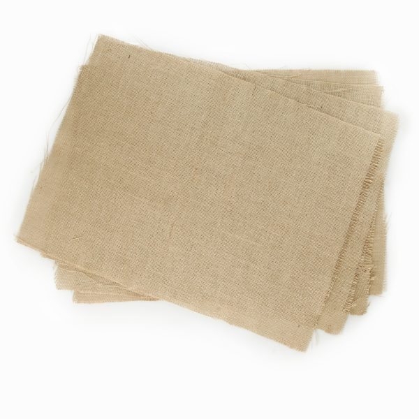 Natural Jute Hessian Sheets placed in a white plain background