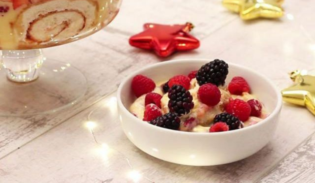 Christmas Trifle Recipe with raspberry red and gold star placed beside