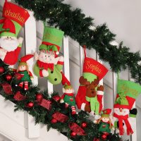 Personalised 3D Christmas Stockings hanging in the staircase with elf Stockings reindeer and Snowman