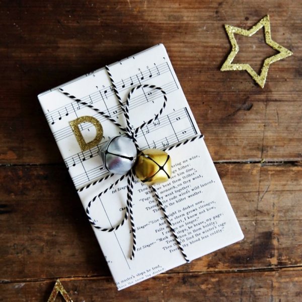 Music Christmas Card with silver and gold bell wrapped