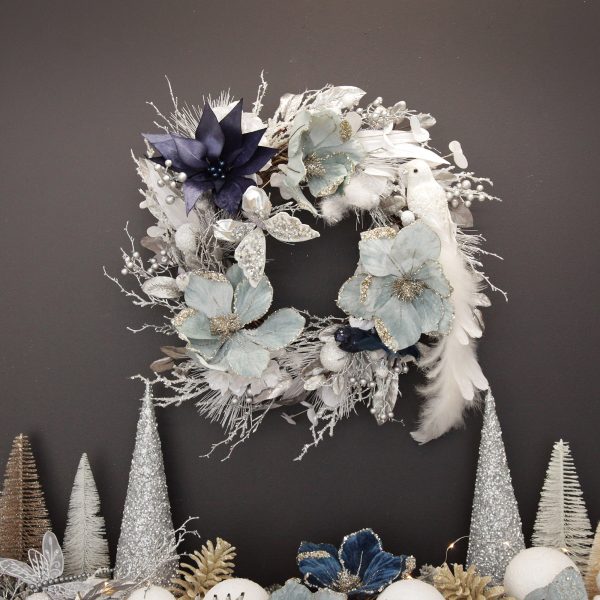 Coastal Chic Christmas Wreath Hanging in the Wall
