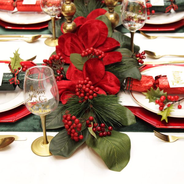 Harlequin Christmas Holiday Table Red Magnolia Flower Green Leaf Spray
