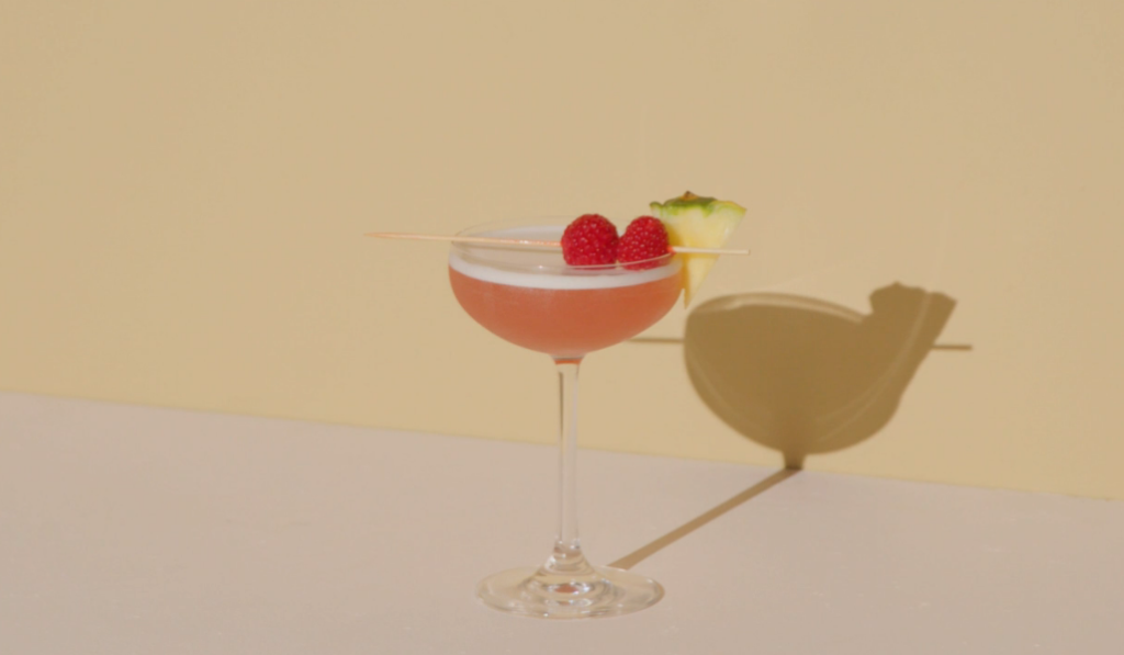French Martiini with raspberry and pineapple with shadows