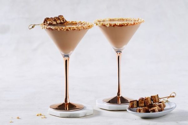Snickers Martini and some snicker treats placed in a small plate