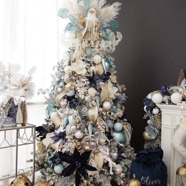 Coastal Chic Christmas Tree in the Middle of the Living Room