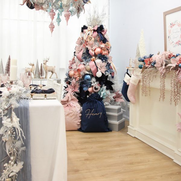 Blush and Blue Christmas Tree in the living room with different sacks