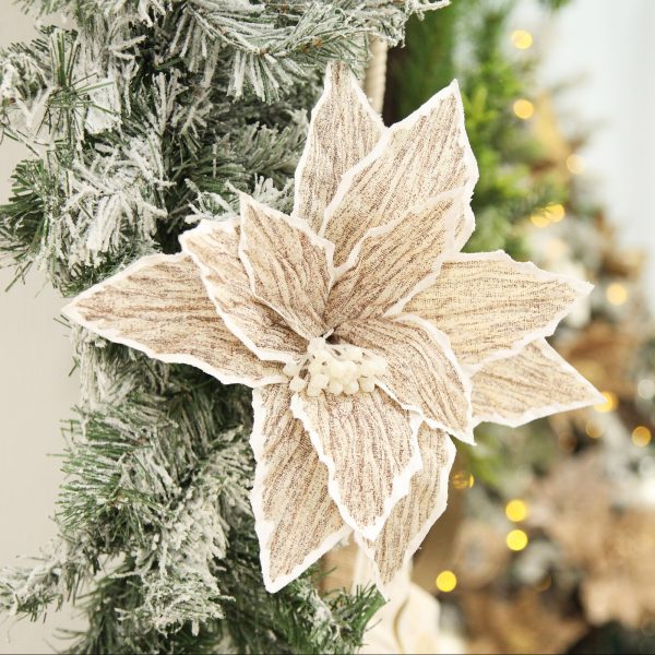 Natural Poinsettia Flower Clip with White Trim Placed in a Garland
