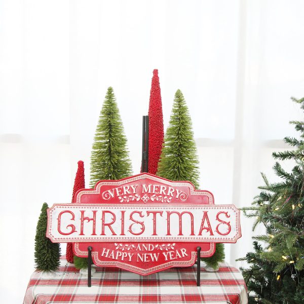Merry Christmas and Happy New Year Retro Metal Christmas Sign placed in a table
