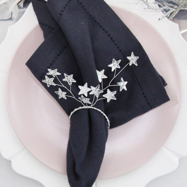Silver Stars Napkin Ring Placed in a Plate