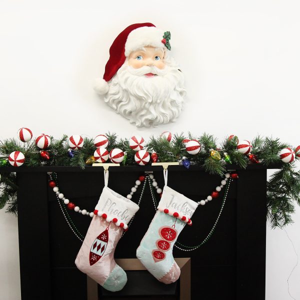 Vintage Red Santa Head Wall Hanging and Personalised stockings in a fire place