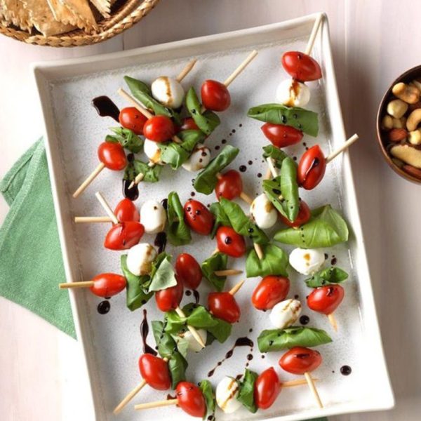 Capress Salad Kabobs Placed in a square plate with sticks