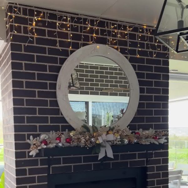Cocktail Party Mantle Top with a Big Mirror placed above the fireplace
