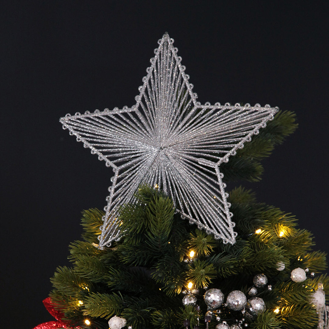 Silver Hollow Glitter Christmas Star on top of Christmas Tree