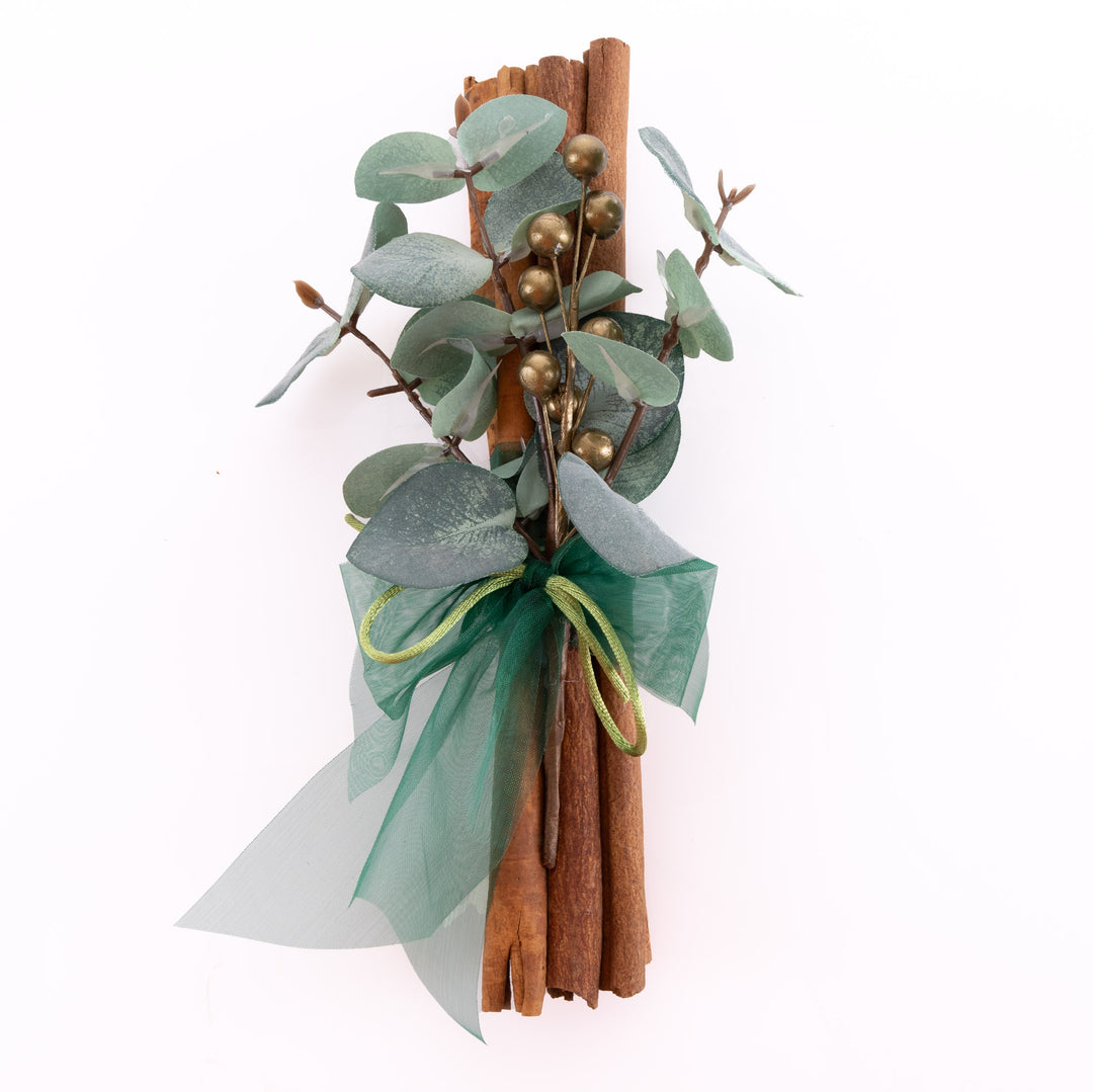 Cinnamon stick bunch snowy pine