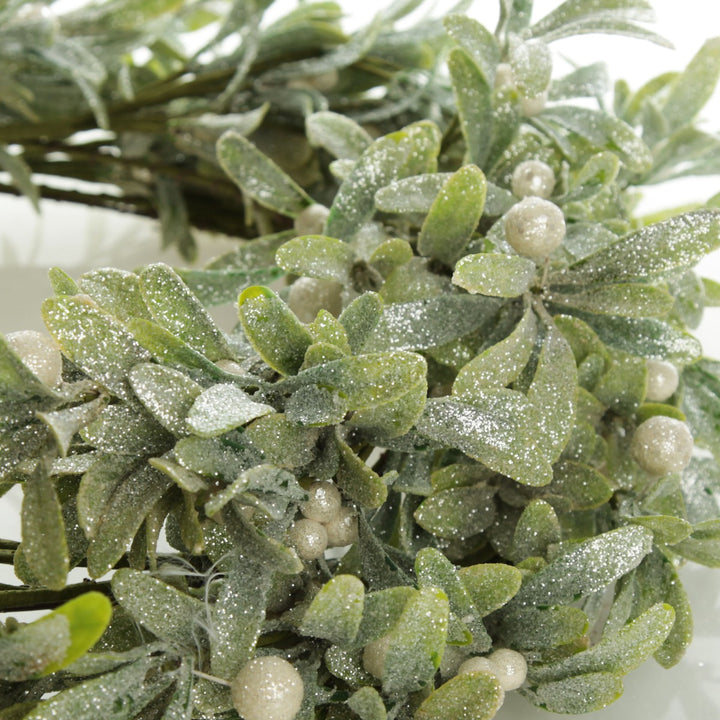 Frosted Green Leaf Christmas Wreath with White Berries Close up