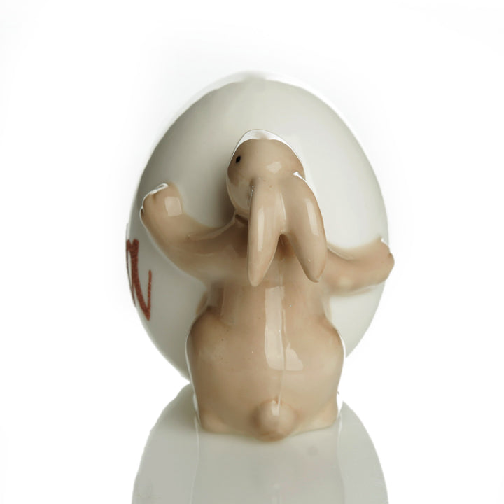 Personalised Ceramic Bunny Holding Egg Ornament