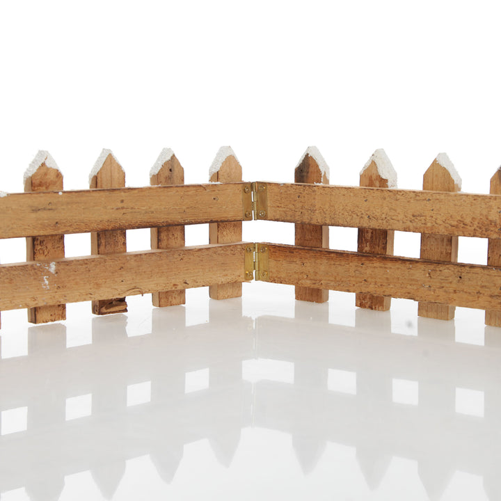 Short Snow Capped Natural Wooden Picket Fence