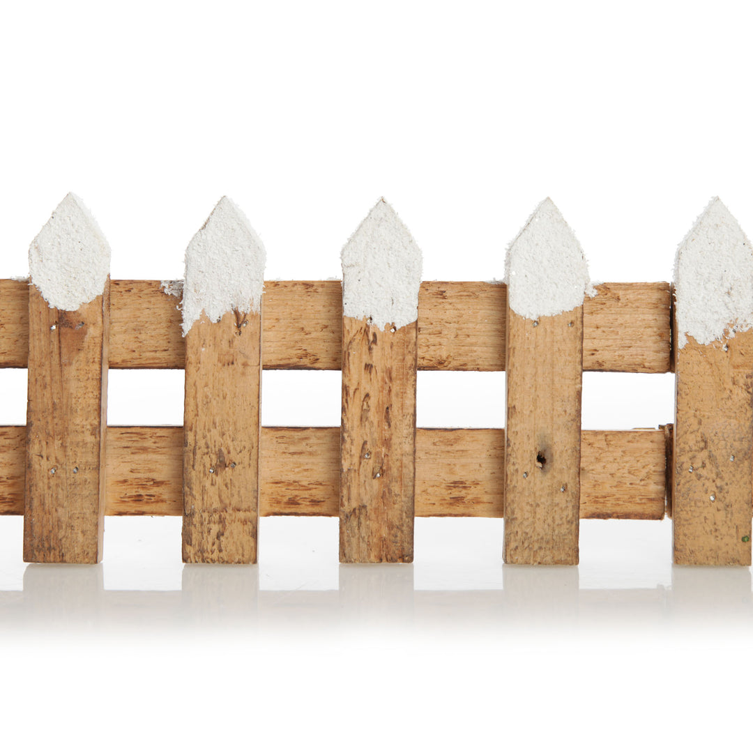 Short Snow Capped Natural Wooden Picket Fence
