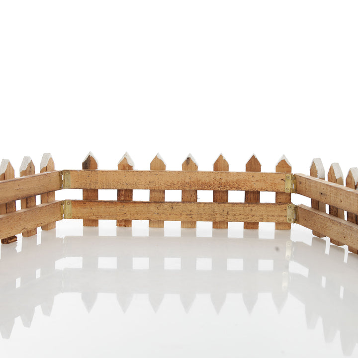 Short Snow Capped Natural Wooden Picket Fence