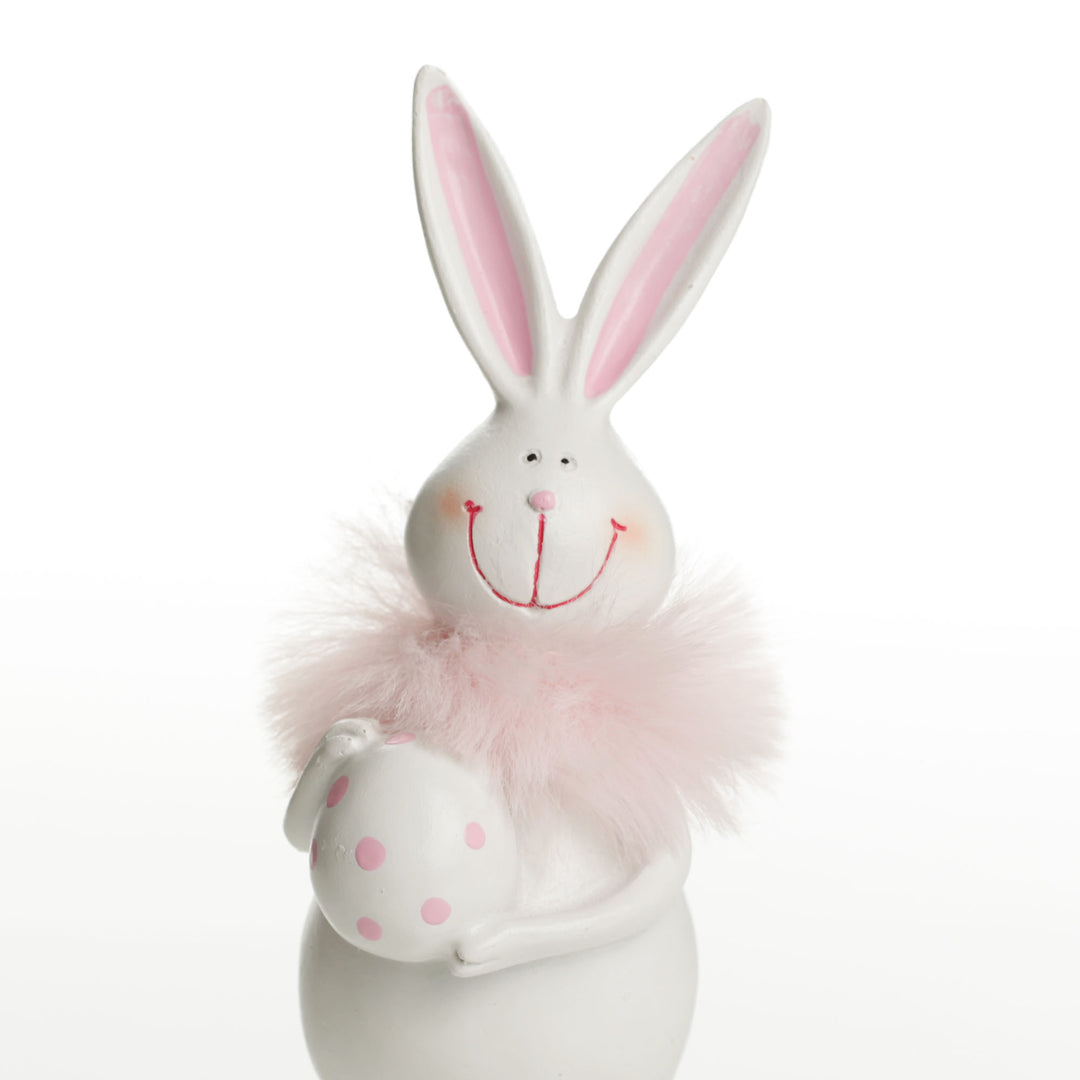 Standing Bunny Holding Egg with Pink Dots and Feathers