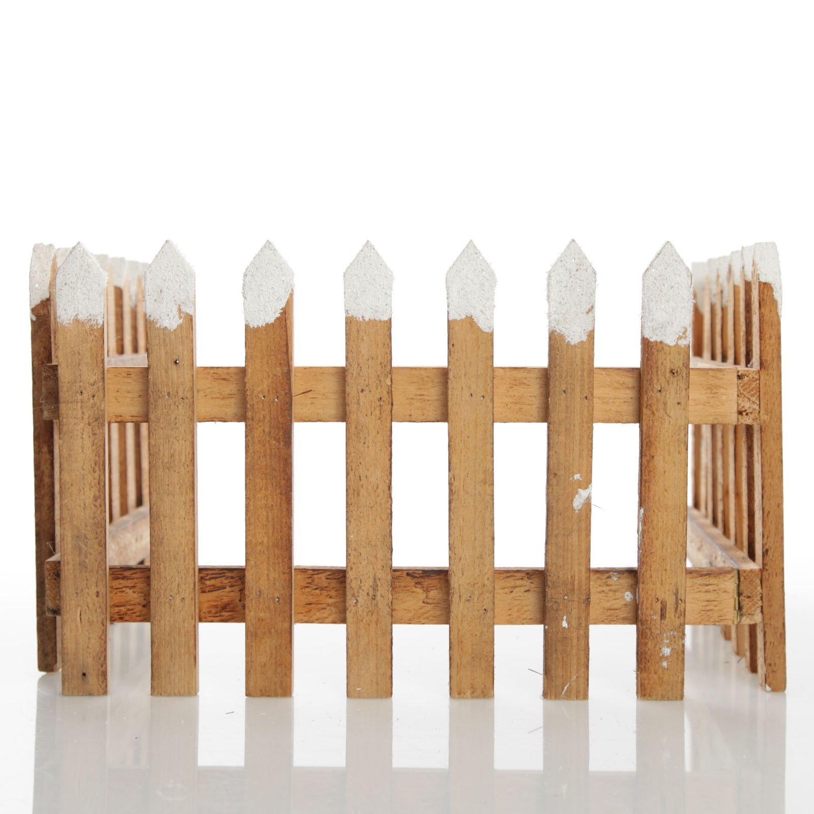 Tall Snow Capped Natural Wooden Picket Fence